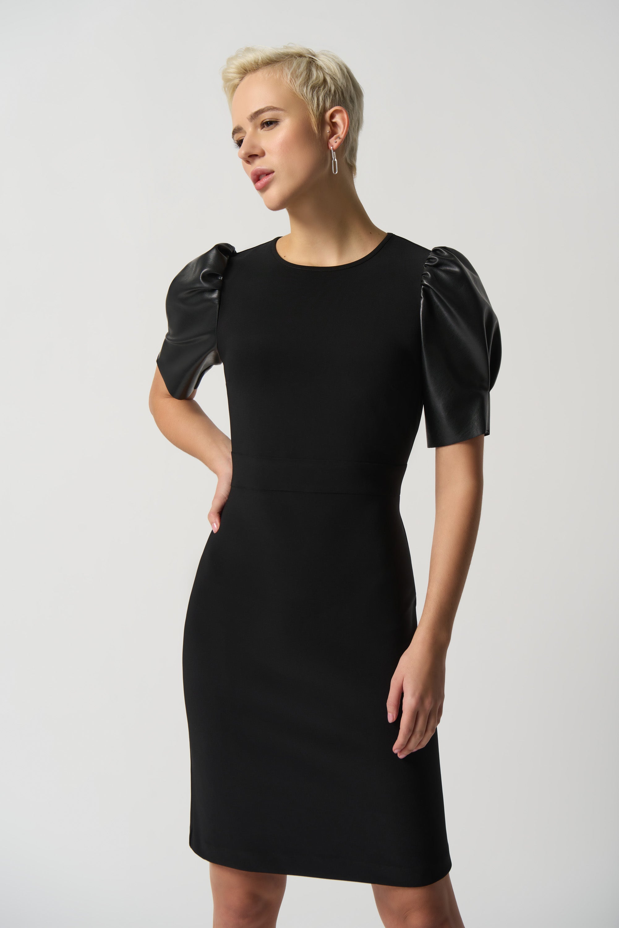 Puff-sleeve black sheath dress
